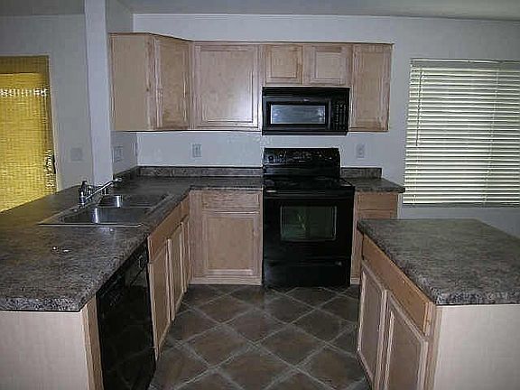 Upgraded Cabinets, Large Pantry and More!