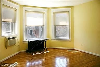 Dining area with hardwood floors.