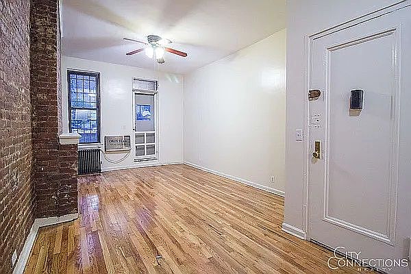1st image of 419 W 56th St APT 1C