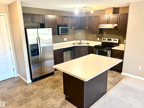 3rd image of 9363 Simpson Dr NW #1304