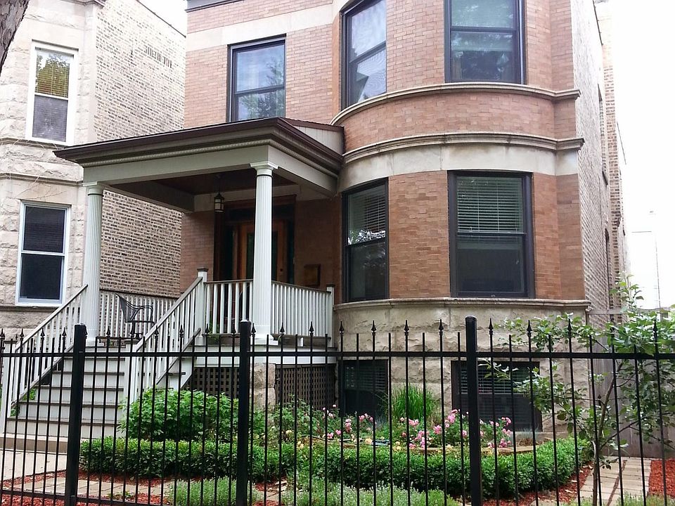 Building Picture w/ gate & well maintained garden
