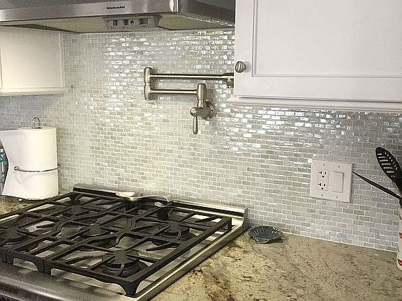 Glass tile, pot filler