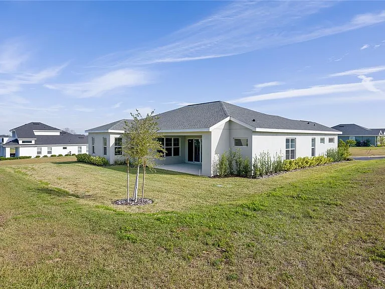 208 Snowy Orchid Way — Photo 32