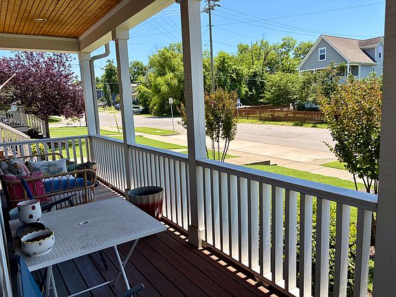 Lovely wide front porch - a great place to start your day, or wind down with a book and a beverage at the end of the day. *NOTE: house comes unfurnished (pics show current owner's furnishings that will be moved).*