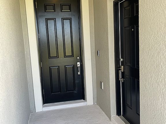 Main Entrance with two Main Doors. Main House and In-Law Suite