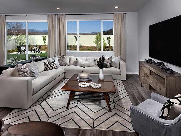 Residence 1 great room modeled at a nearby Meritage community.