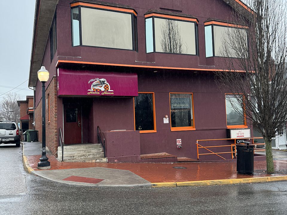 Hokie House, go down the left side side of building on sidewalk. You will see a set of steps go behind steps to ramp