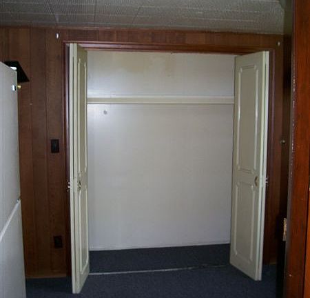 One half of closet in dining room