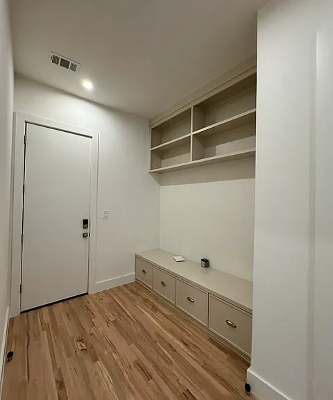 Mud room entry off of garage to the left of the kitchen