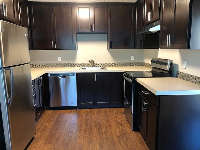Kitchen - 2 bedroom 855 sq ft floorplan - Chocolate Color Scheme
