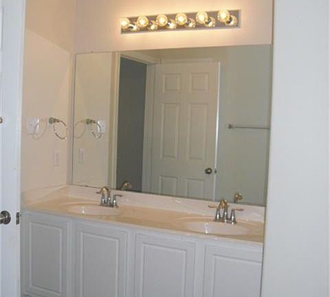 Master bathroom has walk in shower and tub.