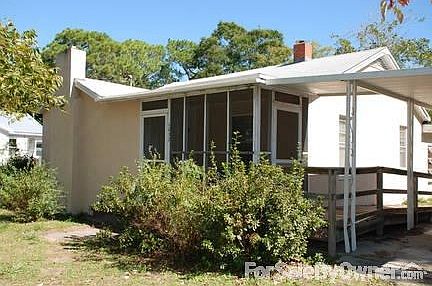 Front Entrance View
						:
						Screened in Porch area; wheelchair ramp; carport to the right