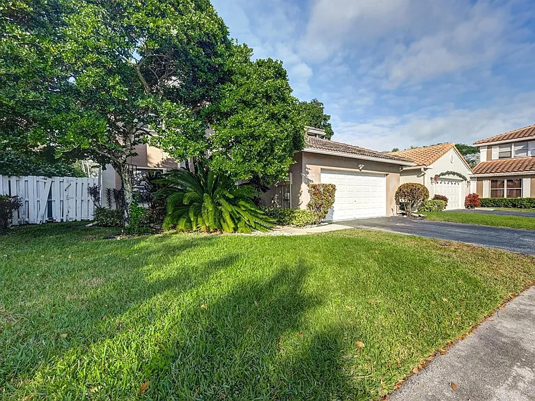 9581 NW 9th Ct — Photo 43