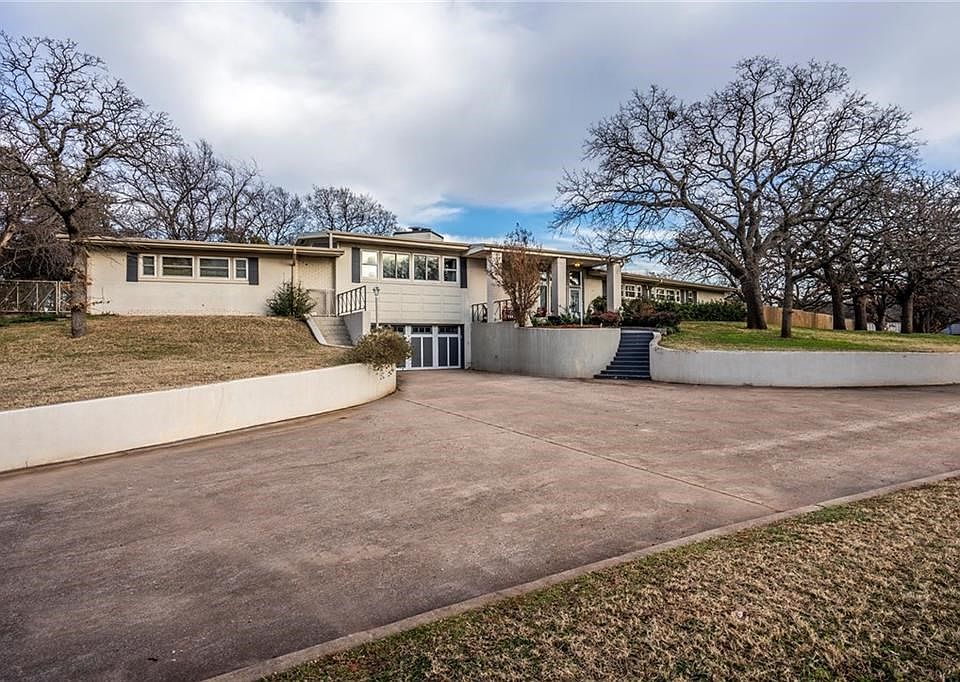 This home is truly one of a kind. It is impressive from the minute you turn the corner and see it from the street for the first time.