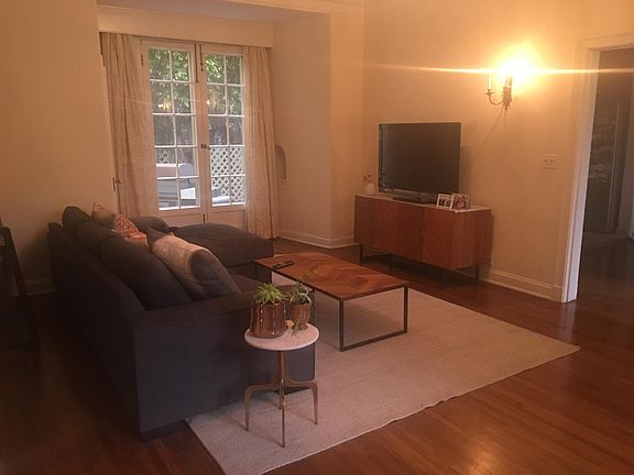 Living room facing the Patio Garden with a Big French Window