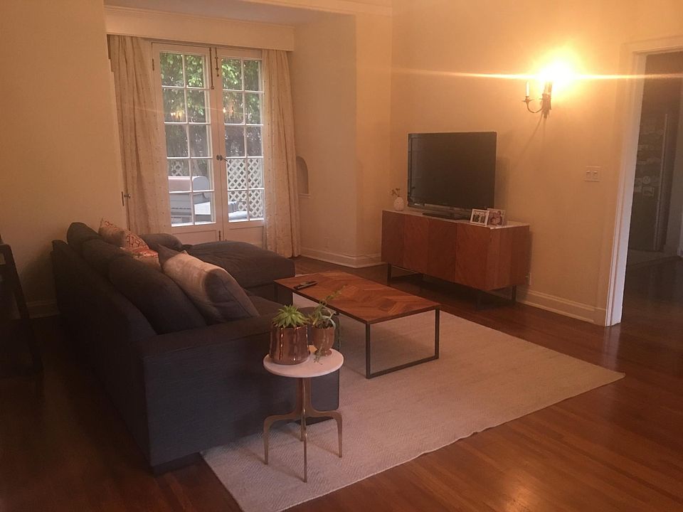 Living room facing the Patio Garden with a Big French Window