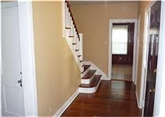 ANOTHER VIEW OF THE FOYER LEADING INTO THE BREAKFAST AREA
