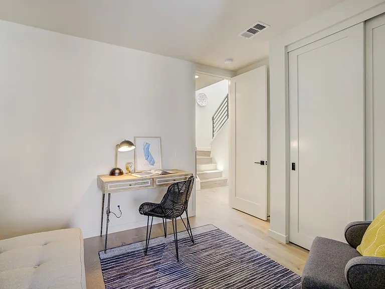 Second bedroom located on the third floor with its own private balcony and closet.