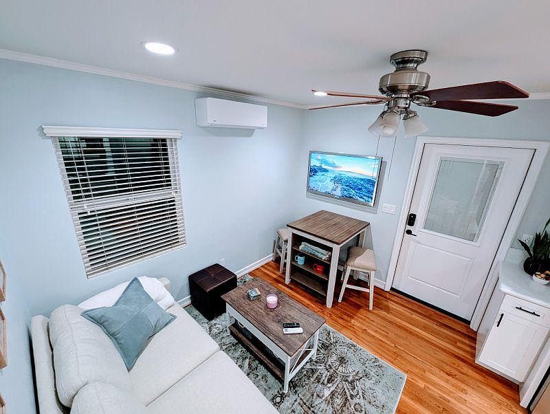 Front door entry into living room/dining area.