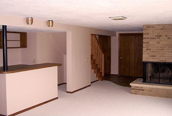 Expansive lower level with 1 of 2 fireplaces