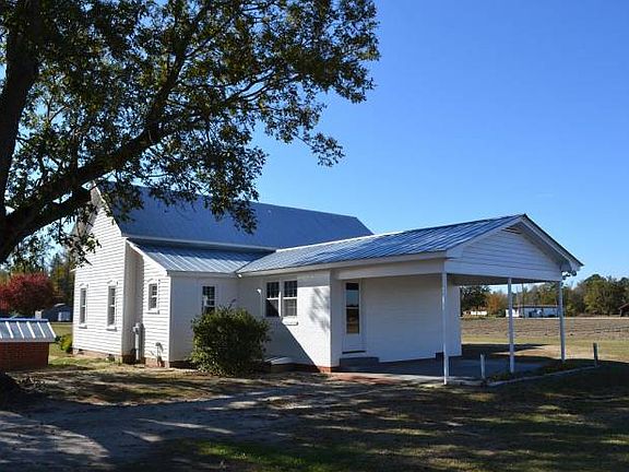Rear View With Carport