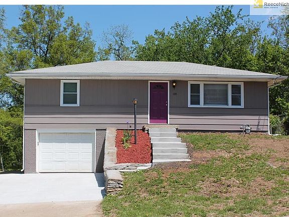 Brand new driveway! 5+ cars! New front steps! New windows. Huge treed lot with fence!
