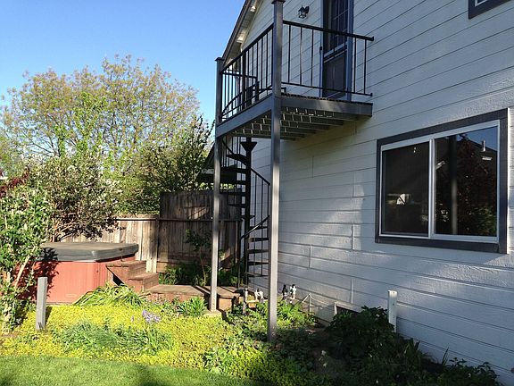 Spa and spiral staircase.
