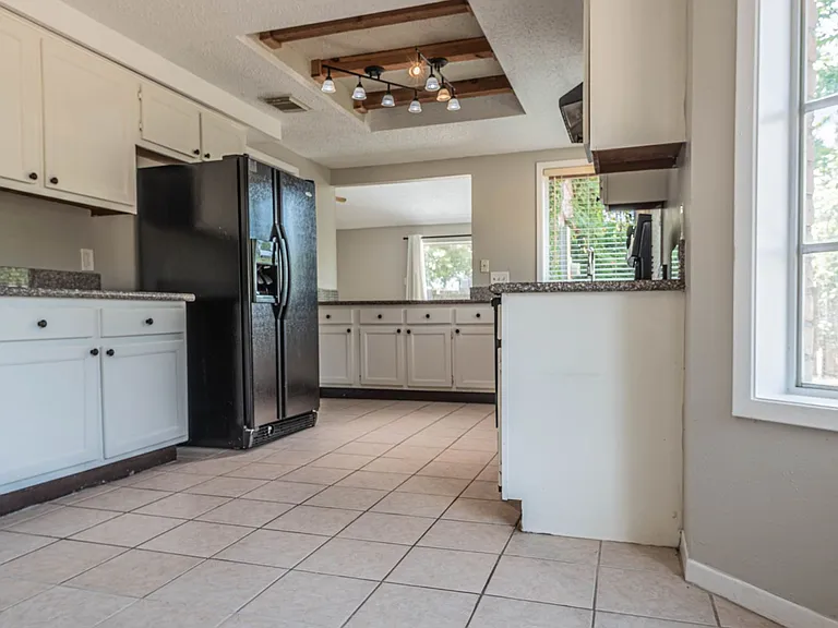 7410 Songwind Ln — Photo 8