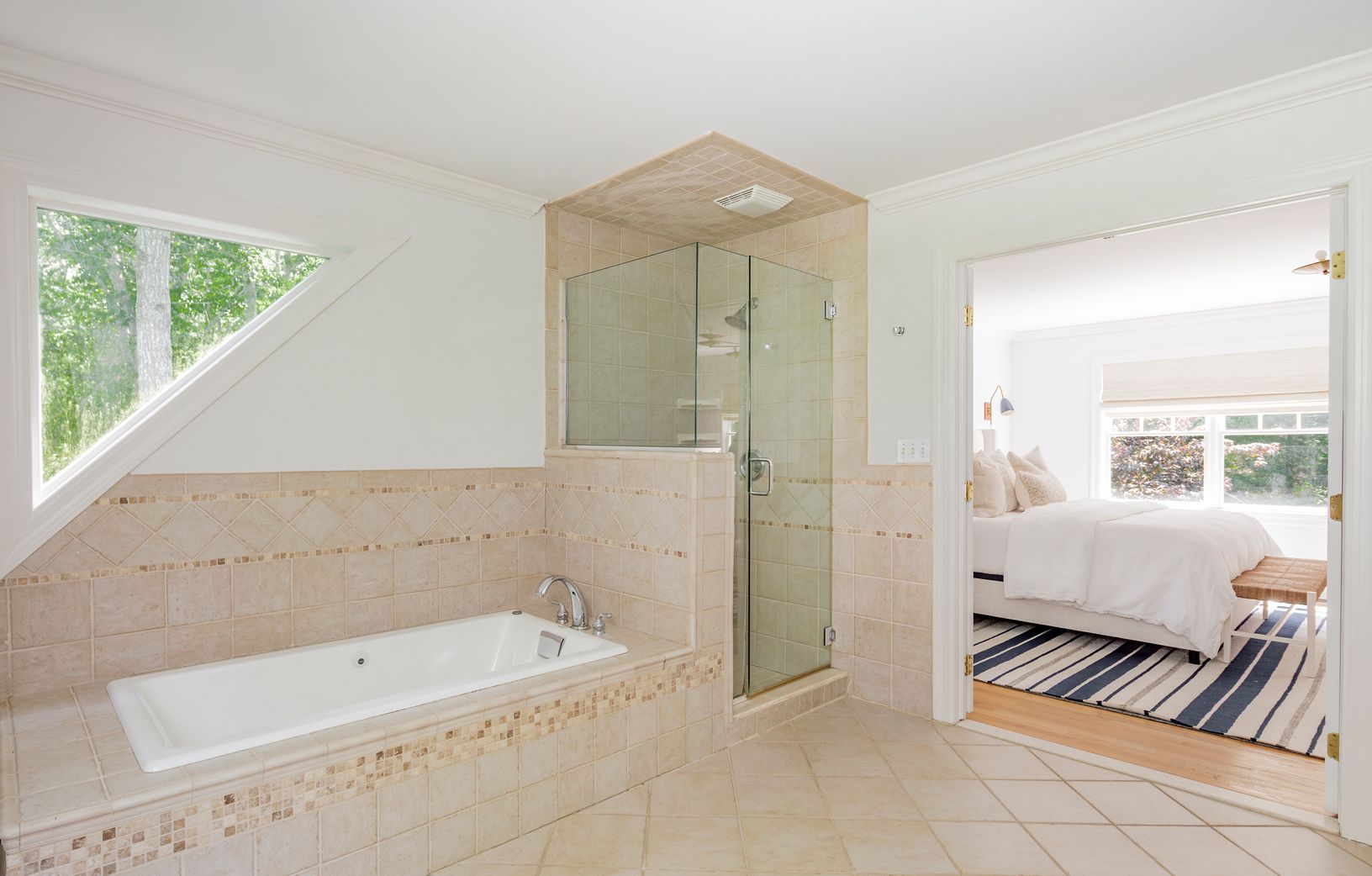  Primary bath with soaking tub and stall shower