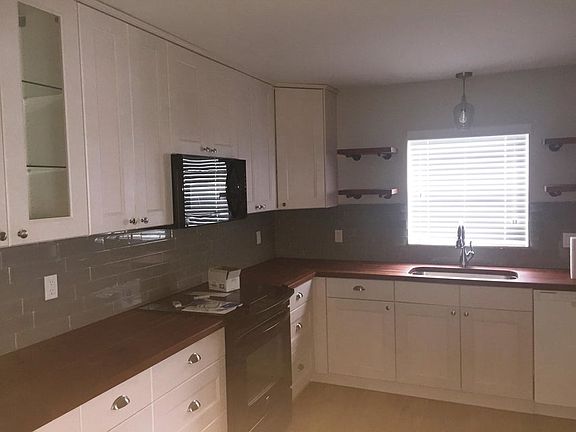 Updated Kitchen with teak countertops