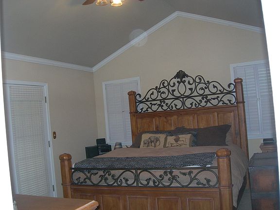 Spacious Master w/French doors to covered patio and hot tub