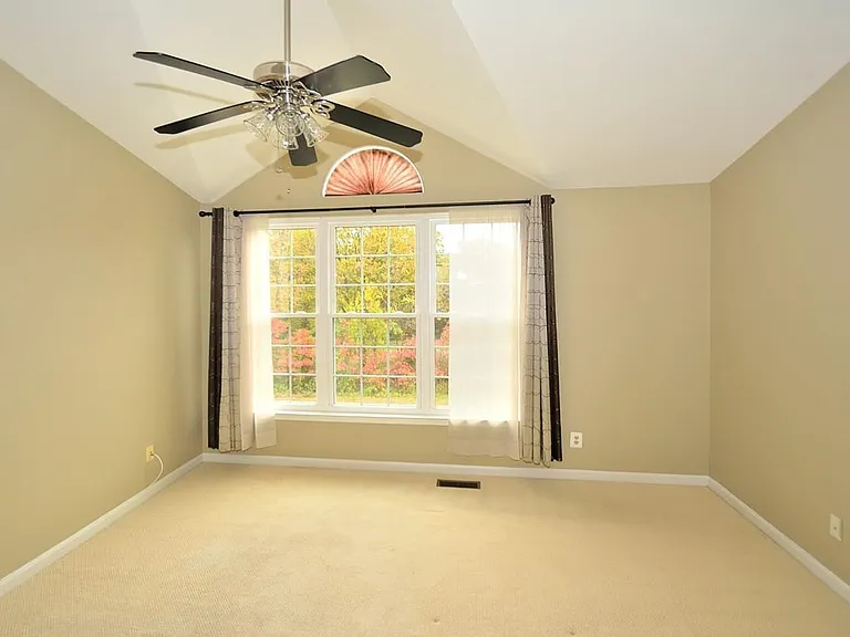 Large master bedroom with private view to Lincolnia Park
