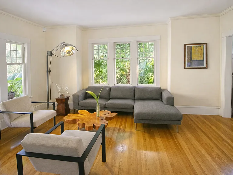Living room w/ original glass windows (facing South)