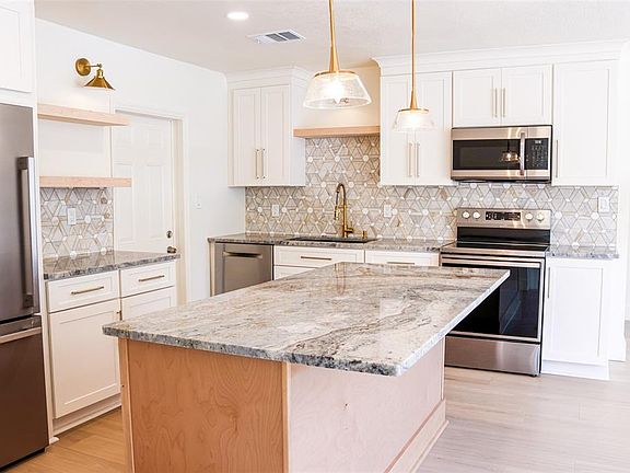 3rd image of 4211 W BAY VIEW AVENUE