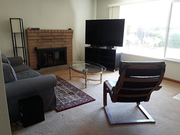 Living room. Window is to front courtyard.