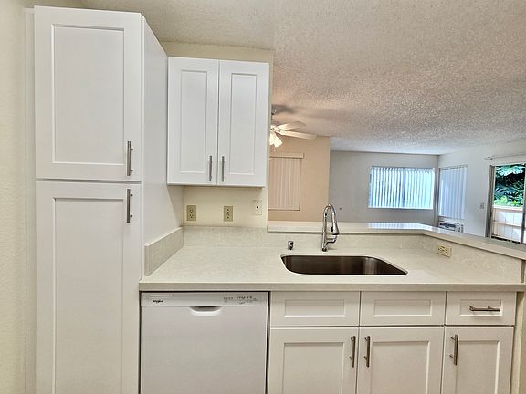 Newly Renovated Kitchen with Deep Sink, Dishwasher and Spray Faucet