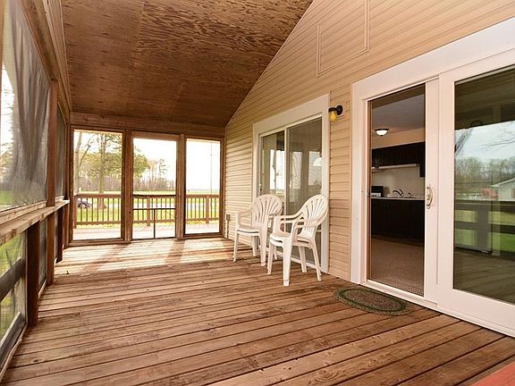 Screened Porch with view of Sliding doors to great room