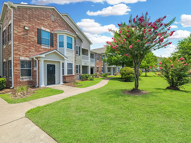 Our townhome-style apartments are surrounded by grassy areas and peaceful scenery and