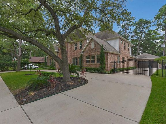 Gated driveway and two car garage.