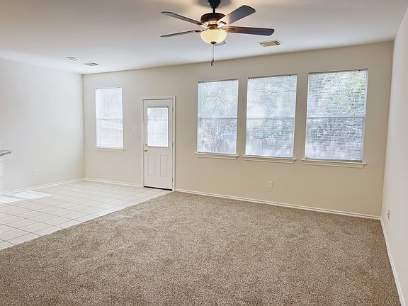 living room + dining area, with an abundance of natural light