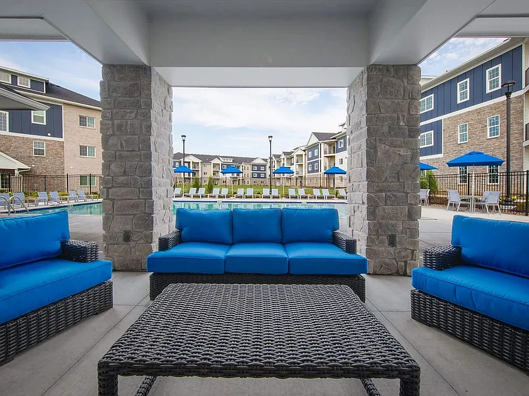 Cozy seating with a poolside view_your favorite hangout spot, day or night.