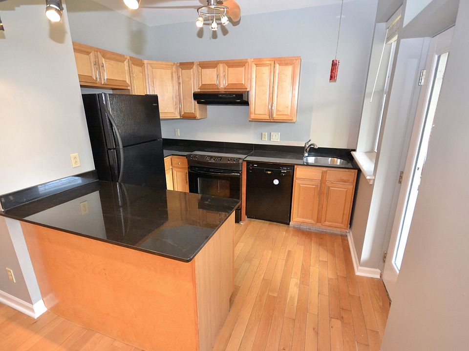Upgraded kitchen with back patio access