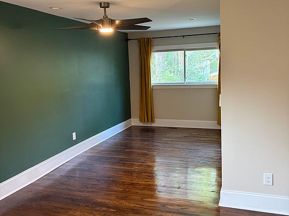 Spacious primary bedroom with extra reading nook.