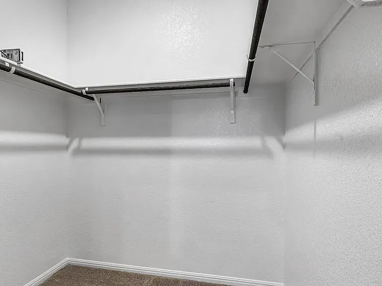 2 off 2 Closets in Master Bedroom