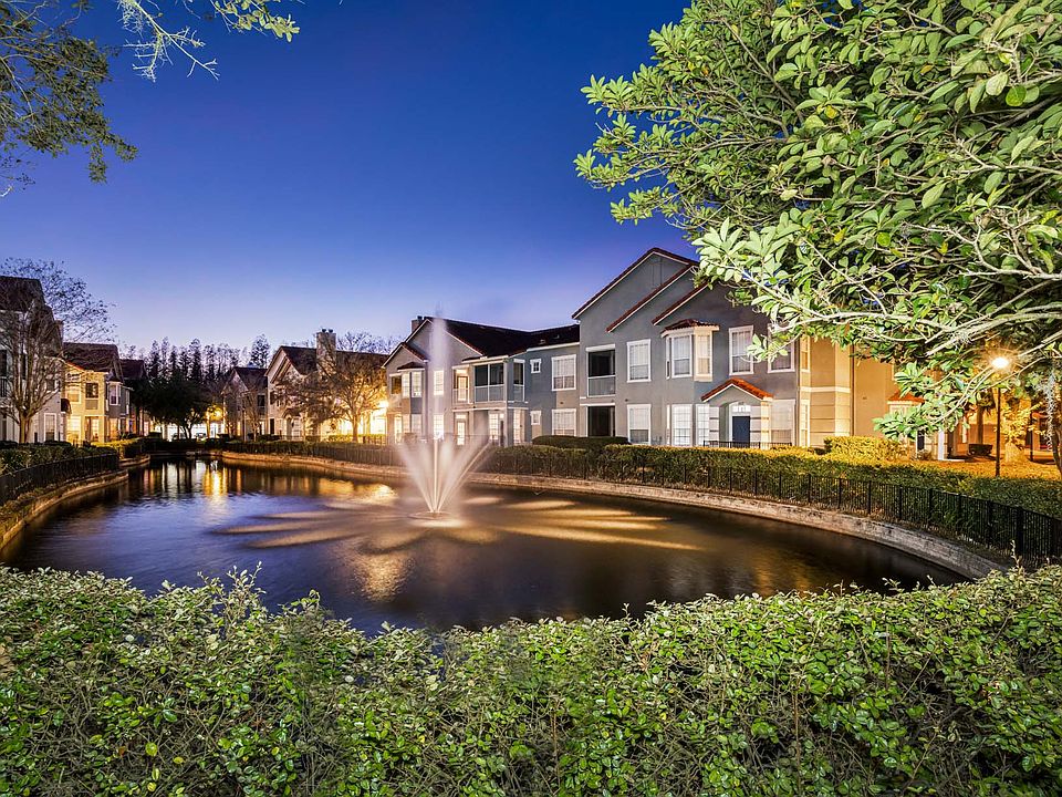 Tranquil water fountains and luxurious landscaping throughout.