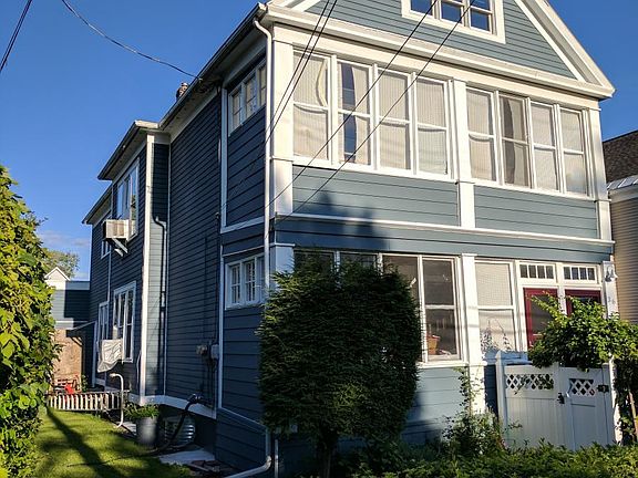 fenced side and front yard