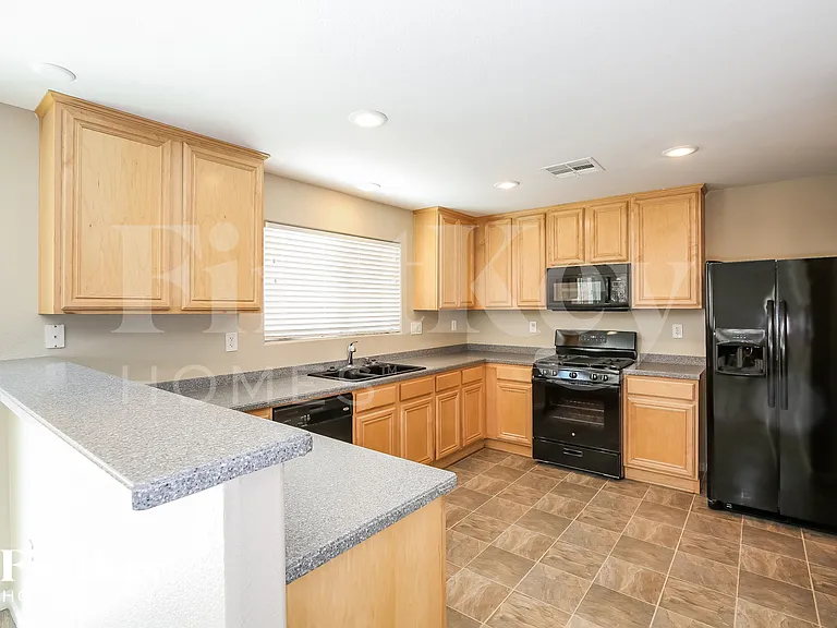 5825 Feral Garden St — Photo 5