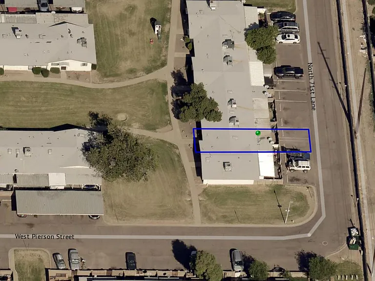 aerial view with 2 assigned parking spaces right by the patio gate