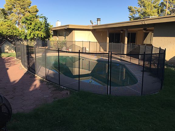 Pool with removable pool fence, right off covered patio, wit