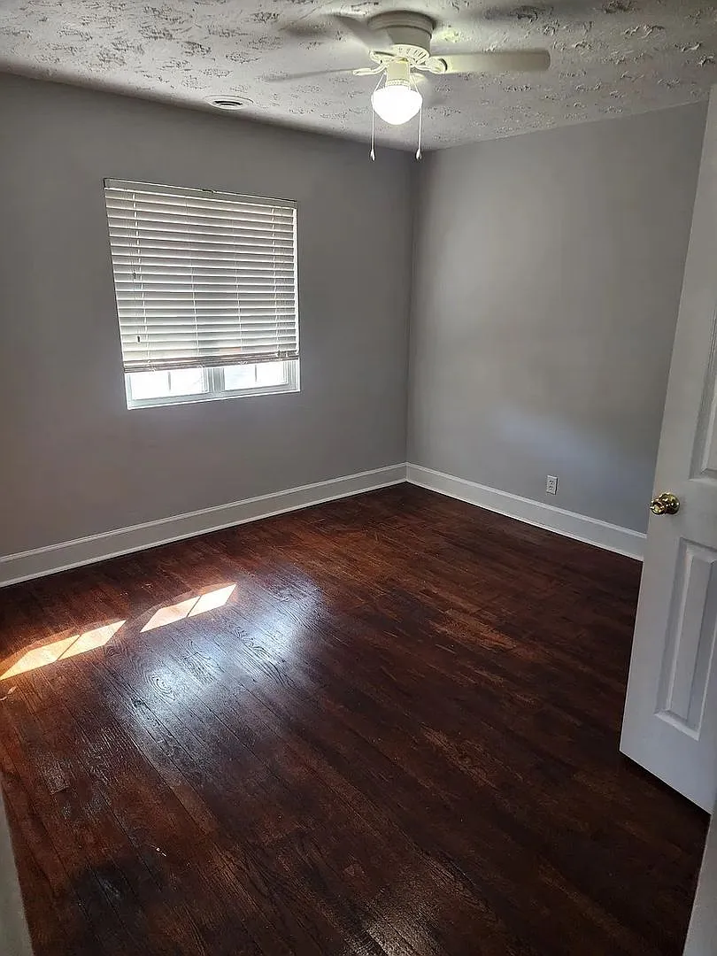 Room in 2 Bedroom Home at 8th St — Photo 1
